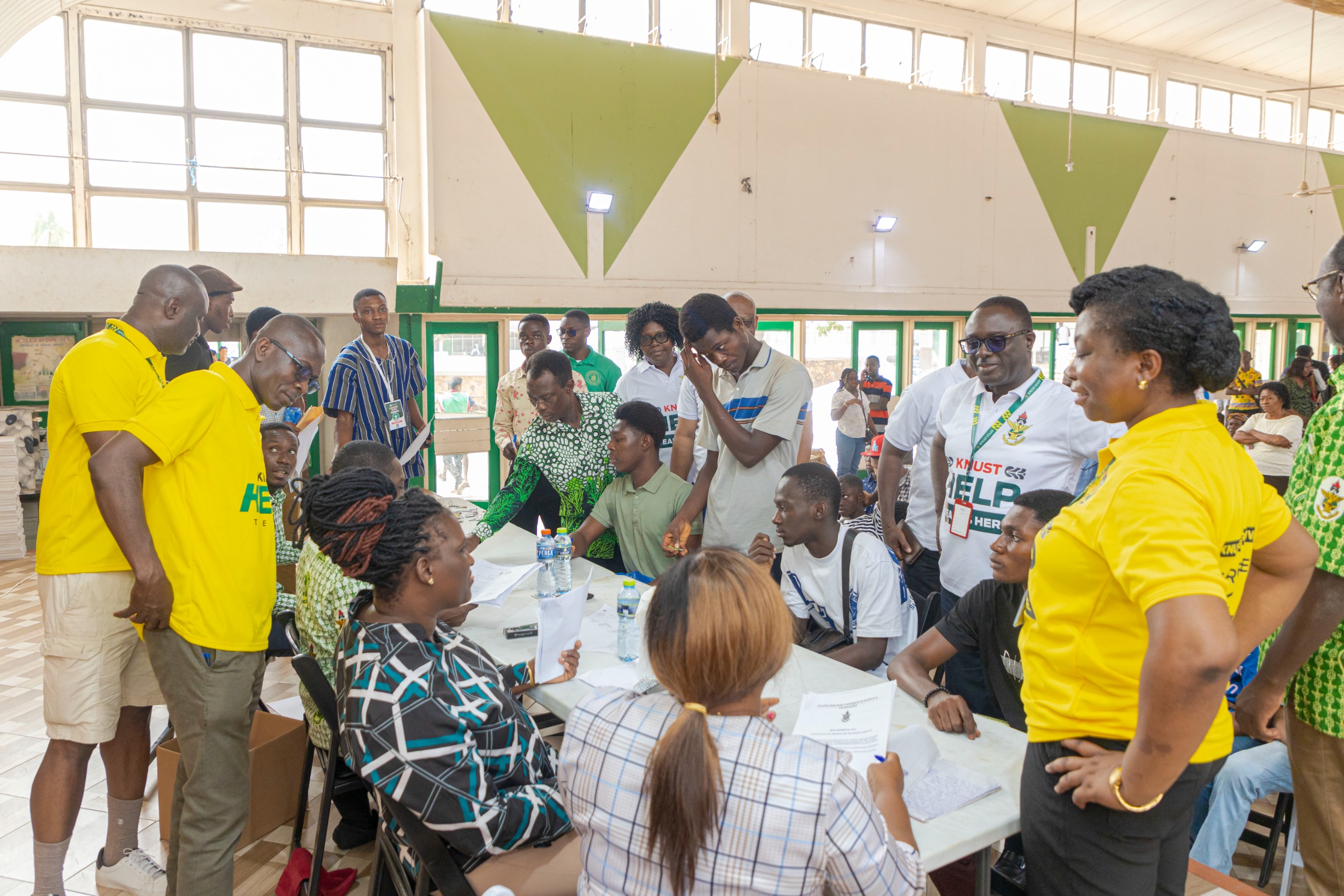 KNUST management team interacting with students and parents.